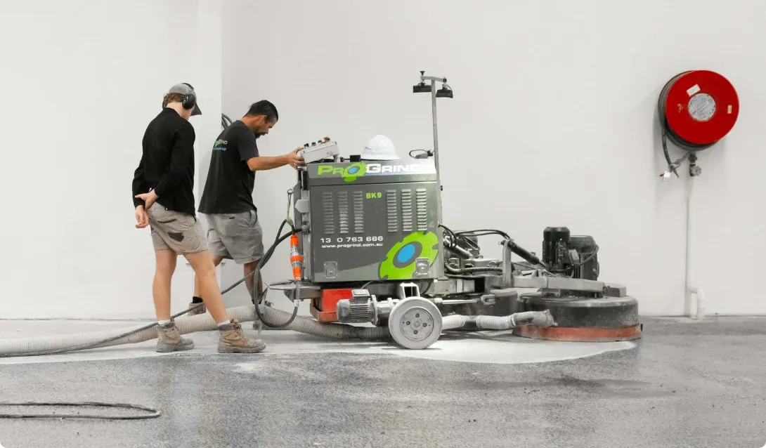 A ProGrind crew running a grinding machine on site